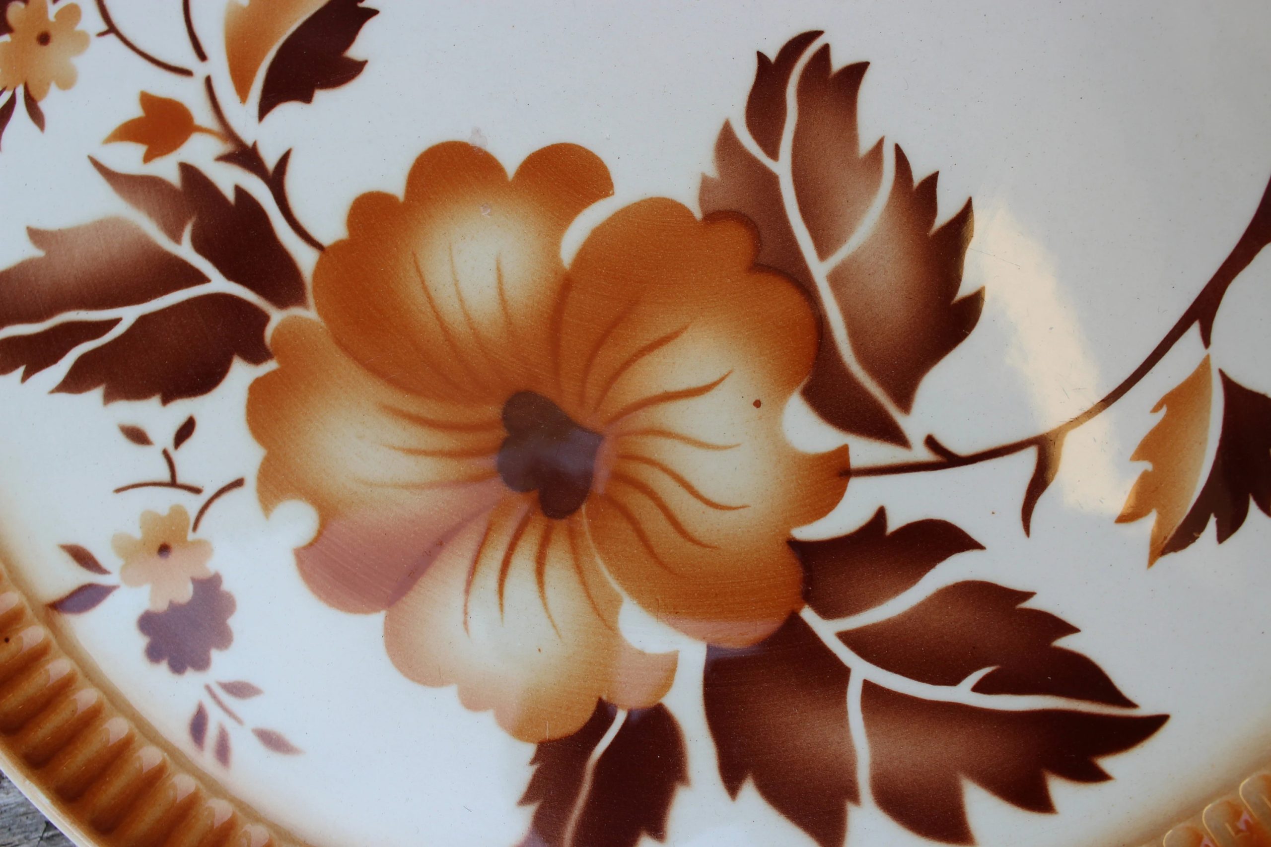 Vintage style ceramic dinner plate with plant and flower design - View 2