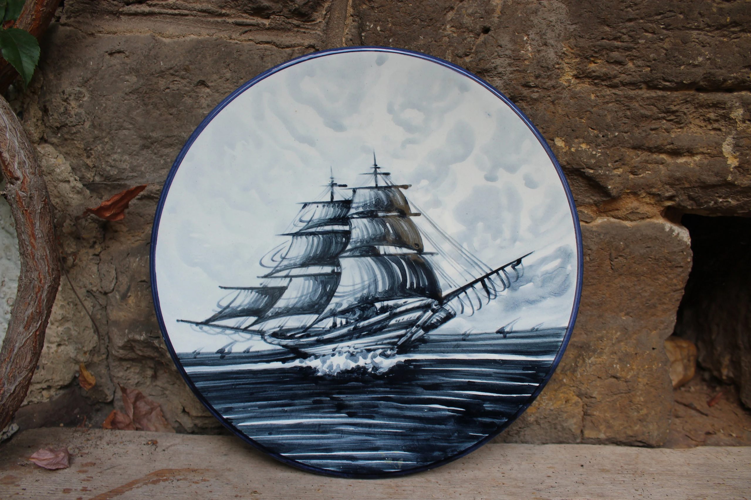 Blue sailboat ceramic decorative plate