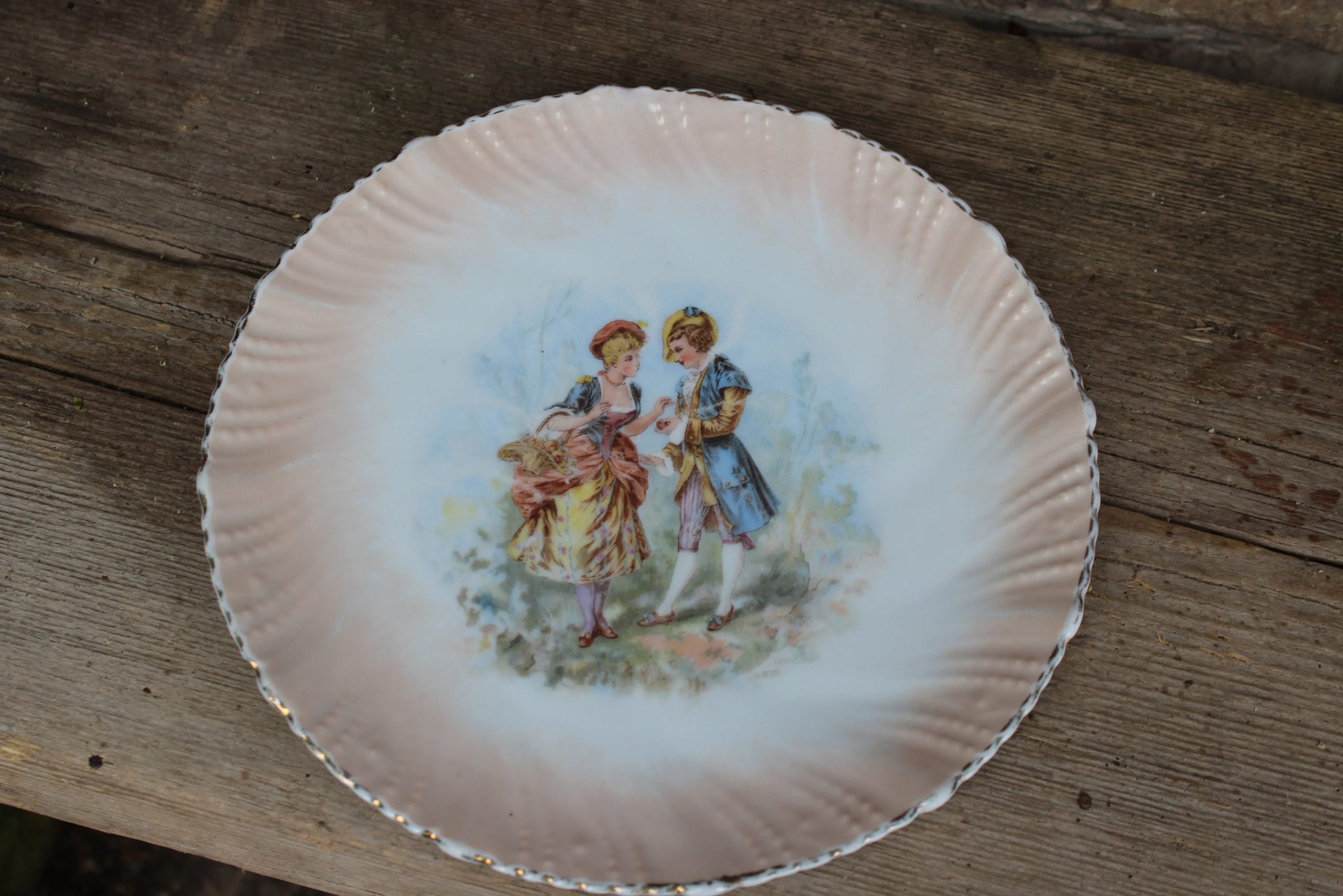 Victorian-era vintage couple ceramic plates